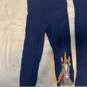 TWO pairs of mini Boden unicorn leggings